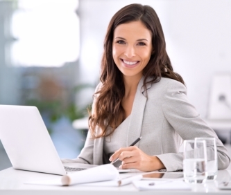 business woman looking at real estate agent website